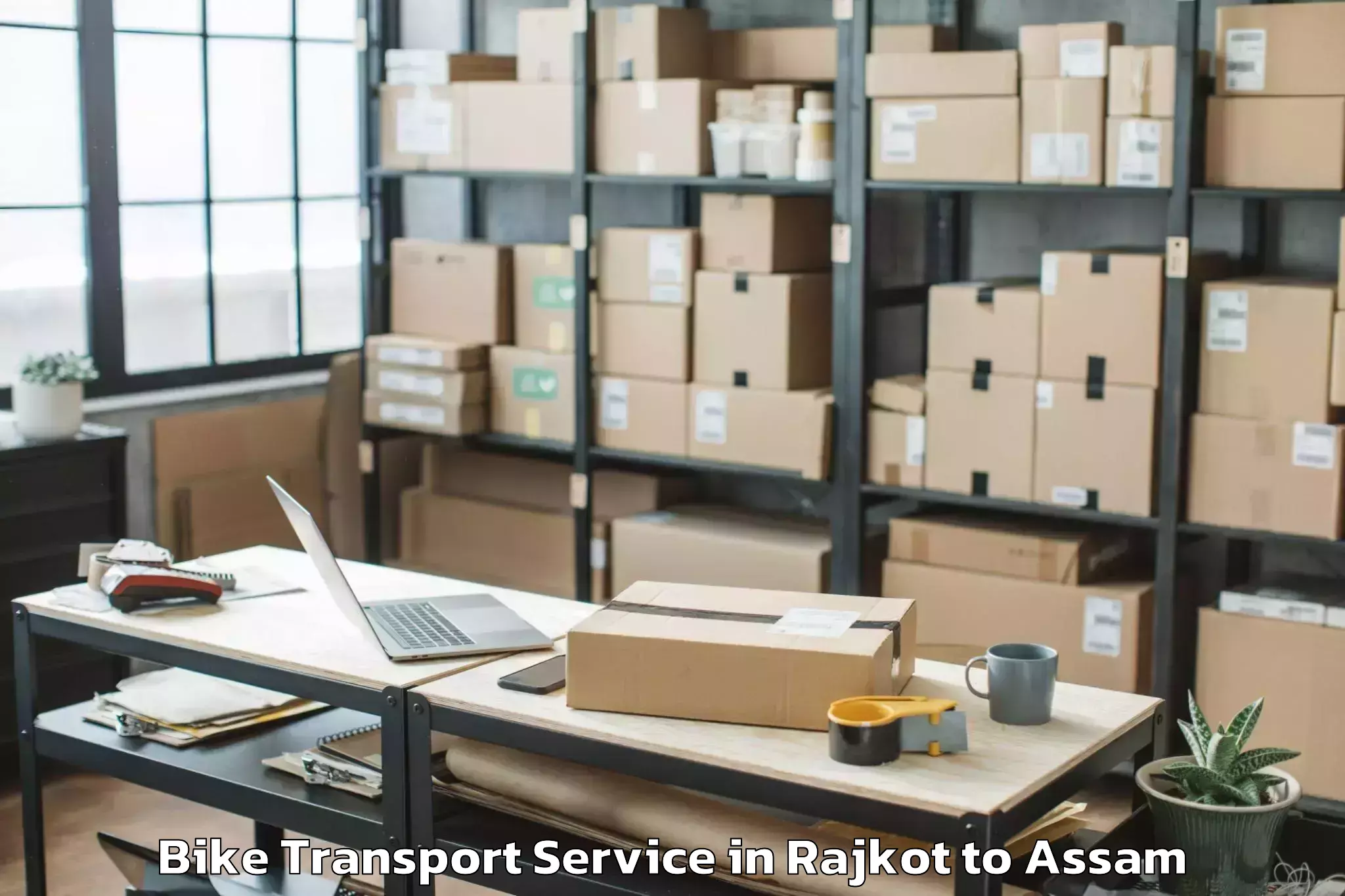 Book Rajkot to Boko Bike Transport Online